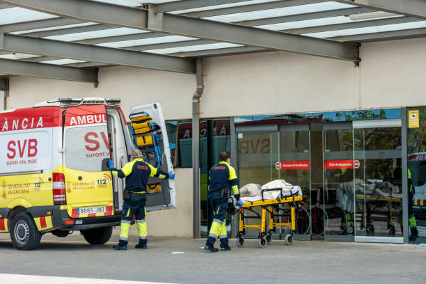 Ambulance at the emergency door of La Fe Hospital. Valencia, Spain stock photo