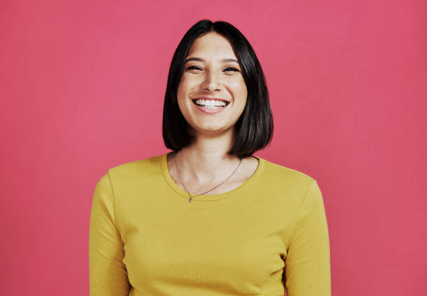 istock She wears her smile like a loaded gun 1215918082