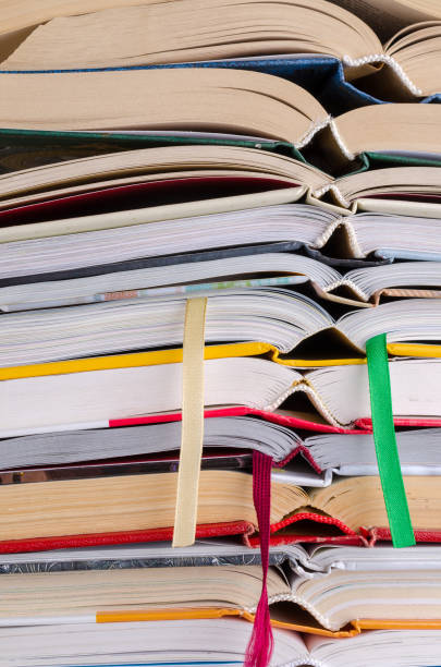 istock Closeup background of a stack of books. 1215918104