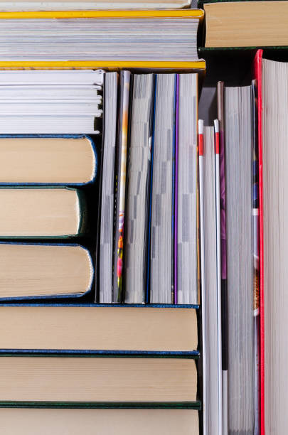 istock Closeup background of a stack of books. 1215918171