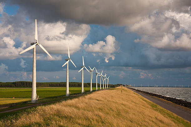 istock Dutch Windturbines and a cloudscape in the last dayight 121591852