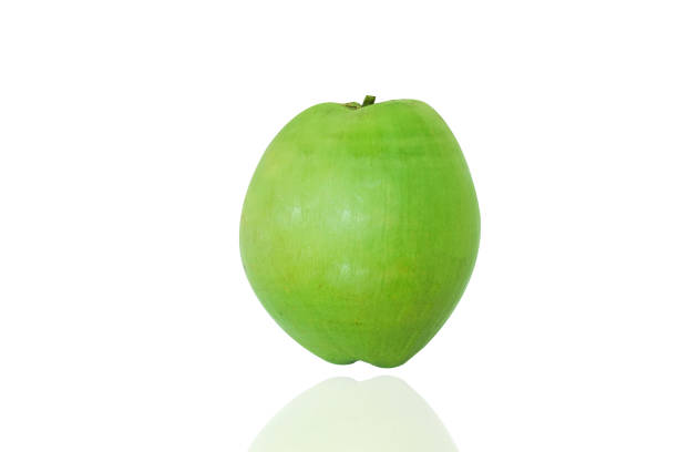 istock Green coconut on the white background . 1215919073