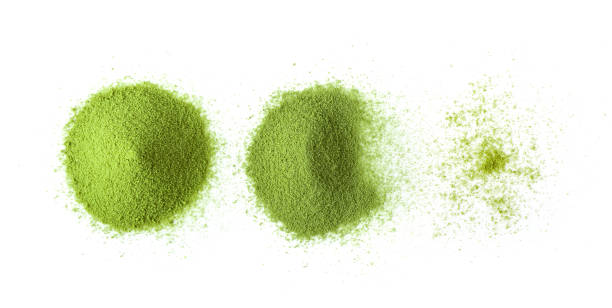 matcha green tea powder on white background. top view