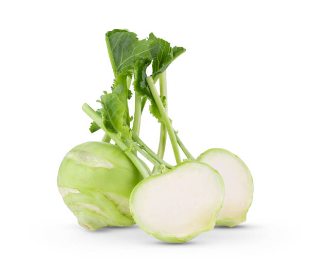 fresh kohlrabi with green leaves on isolated white backround. full depth of field - kohlrabi turnip kohlrabies cabbage imagens e fotografias de stock