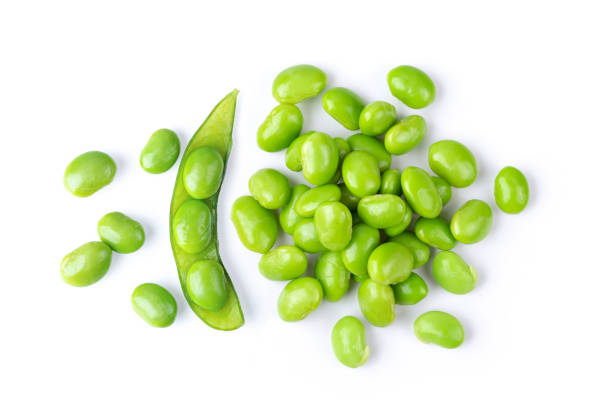 istock green soybeans seeds isolated on white background. top view 1215925834