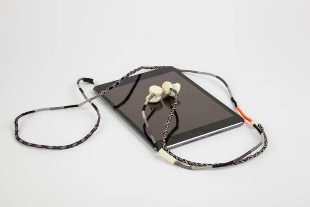 istock digital tablet with headphones 1215926973