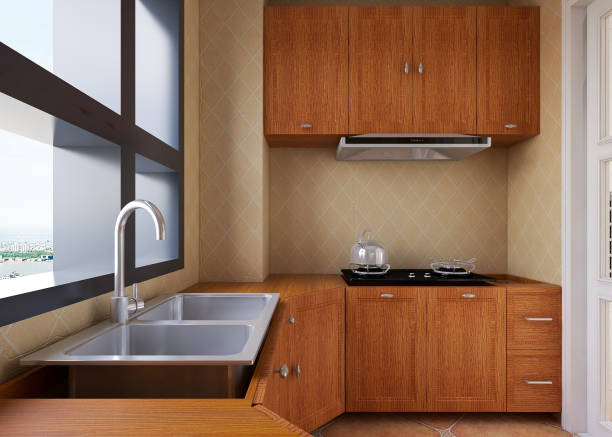 istock 3D rendering, American-style kitchen design, brand new cabinets and kitchenware with refrigerator, sunlight comes in through the window. 1215928076