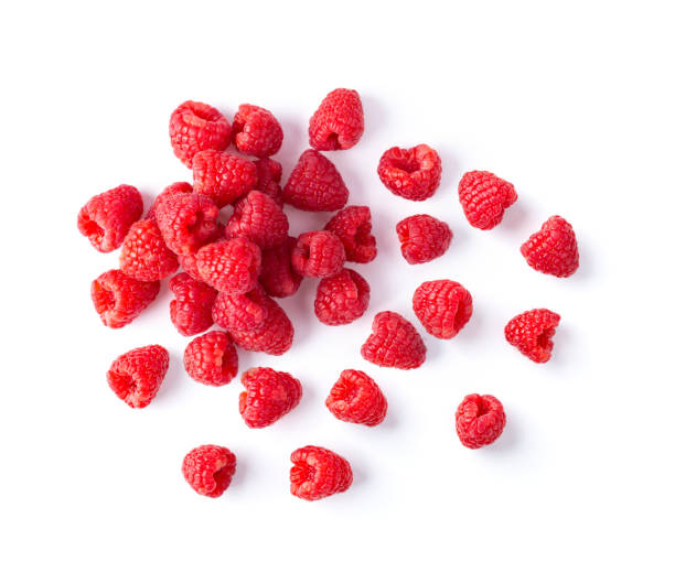 istock ripe raspberries isolated on white background 1215928342