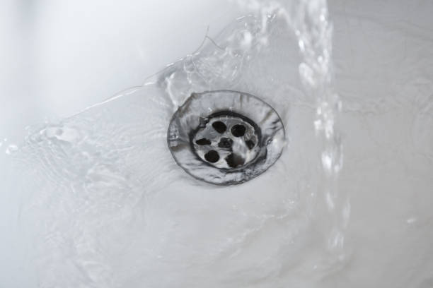 istock Bathroom sink, washbasin with running water 1215935152
