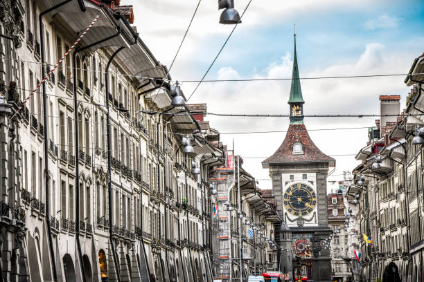 istock Bern Clocktower And Bustling Street 1215937362