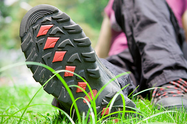 istock Female hikers relaxing on lawn 121593760