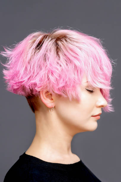 istock Woman with pink hairstyle. 1215938407