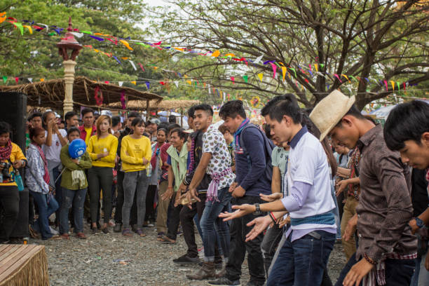 group of young people dancing at bonn phum - traditional festival in cambodia - khmer imagens e fotografias de stock