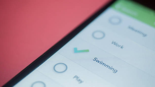 istock checklist box in appication on smarthphone close up. Checklist concept 1215943794