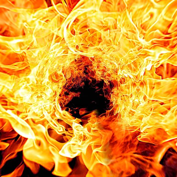 istock Abstract background with swirling flames 1215944120