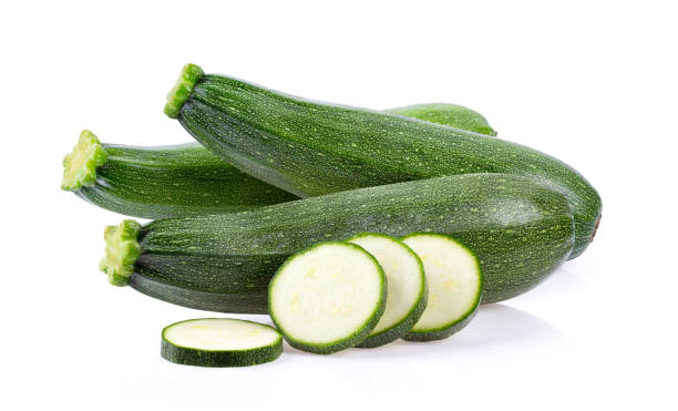 istock fresh zucchini isolated on white background 1215944908