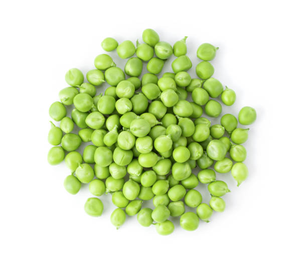 istock Green peas isolated on white background 1215945012