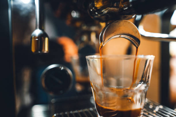 istock Coffee-Make,coffee from the machine at home 1215946332
