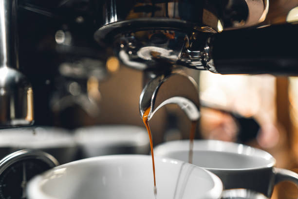 istock Coffee-Make,coffee from the machine at home 1215946503