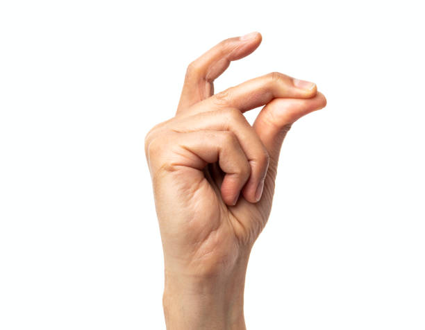 man snapping his fingers Studio shot of an unrecognizable man snapping his fingers against a white background click finger stock pictures, royalty-free photos & images