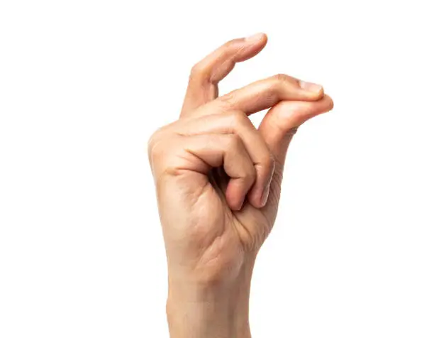 Studio shot of an unrecognizable man snapping his fingers against a white background