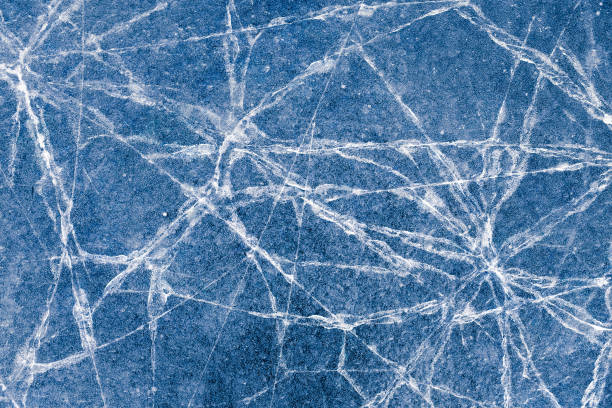 istock beautiful ice with cracks. texture of frozen water 1215948128