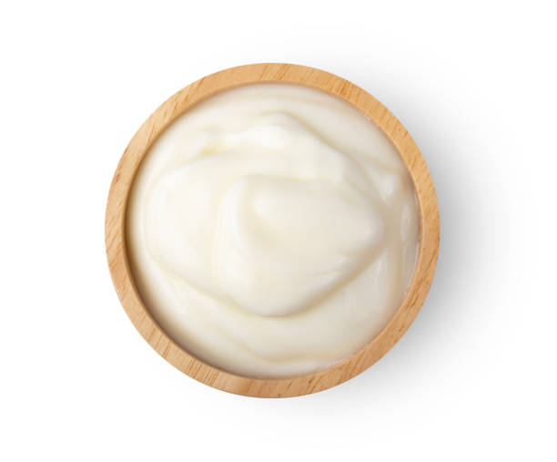 istock yoghurt in a cup isolated on white background . top view 1215948741