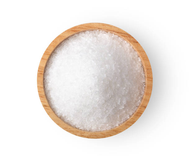 istock monosodium glutamate in wood bowl on white background. top view 1215948867