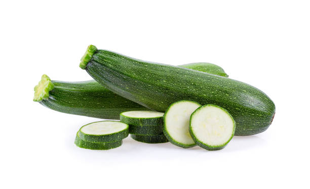 istock fresh zucchini isolated on white background. full depth of field 1215948930