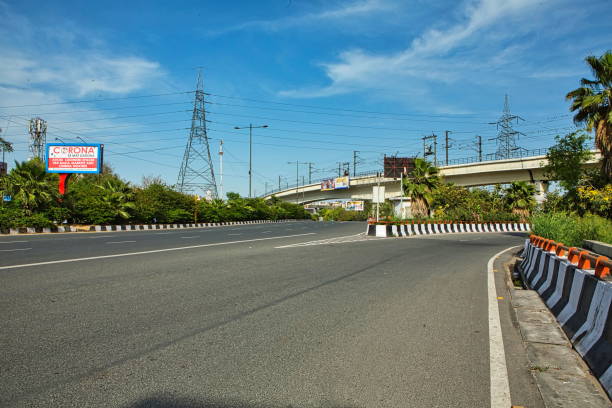 Coronavirus Quarantine Lockdown in New Delhi, India New Delhi, India, March 30th 2020: One of the highest busy road is now empty due to Coronavirus Quarantine time lockdownin New Delhi doncaster photos stock pictures, royalty-free photos & images