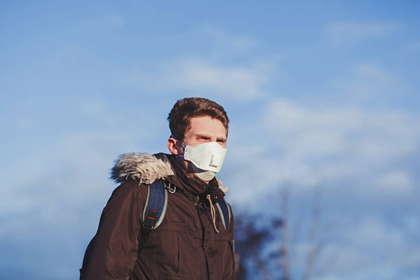 istock Young man with medical mask 1215951808