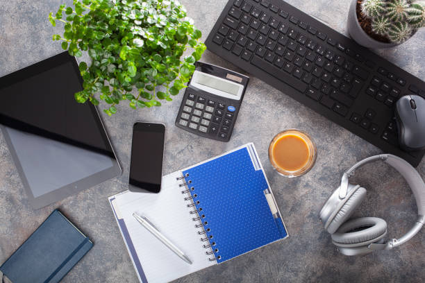 istock home office desk with keyboard computer smartphone notebook houseplants, workspace at home 1215952405