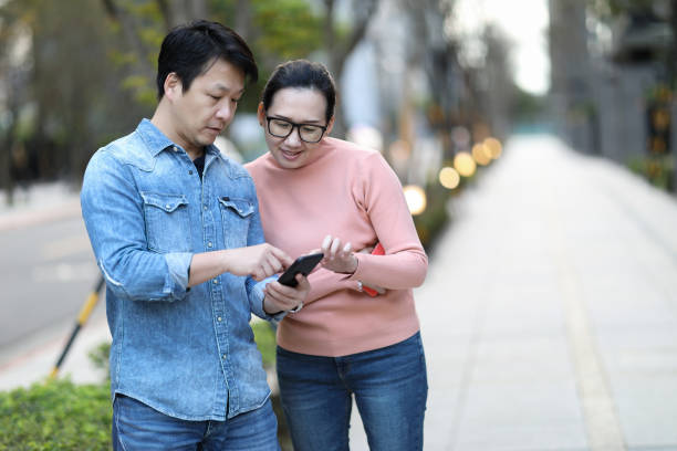 istock Share mobile information on the street 1215952564