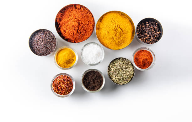 Variety of spices and herbs on kitchen table