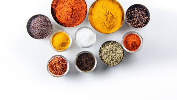 istock Variety of spices and herbs on kitchen table 1215958994