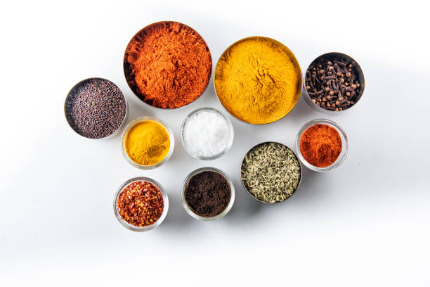 istock Variety of spices and herbs on kitchen table 1215959039
