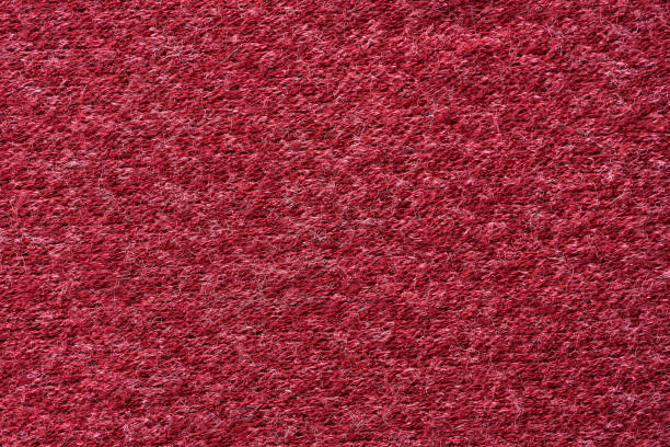 istock Closeup red texture of woolen knitted fabric. Pattern of red fabric. 1215962195