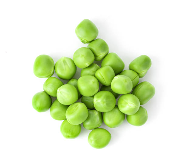 istock Green peas isolated on white background 1215962923