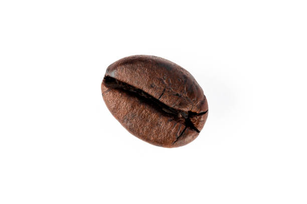 istock Close up roasted coffee beans on isolated white background 1215969670