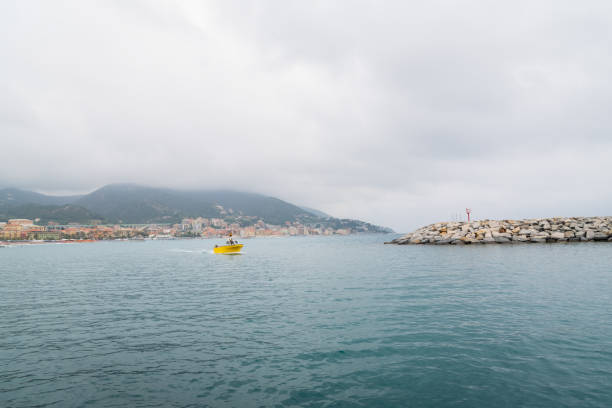 istock Yellow fishing boat while returning to the harbor 1215972215