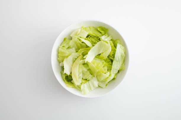 istock a lettuce salad in a white bowl. 1215973452
