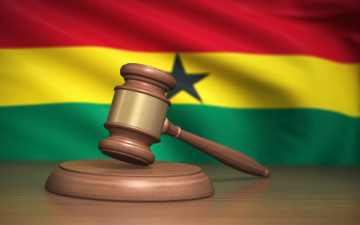 3d Render Judge Gavel and Ghana flag on background (Depth Of Field)