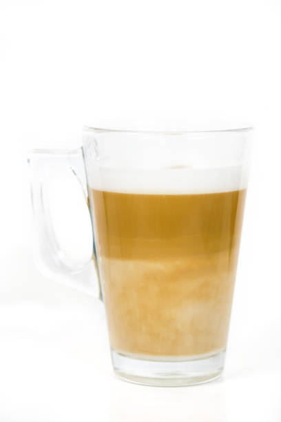 istock cup of cappuccino on a white background 1215975304
