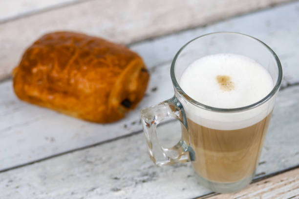 istock cup of cappuccino on a white background 1215975337