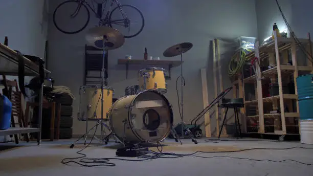 Photo of Rehearsal point in a garage with a drum