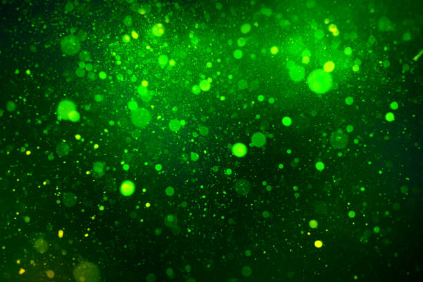 istock abstract green bokeh on a black background 1215983186