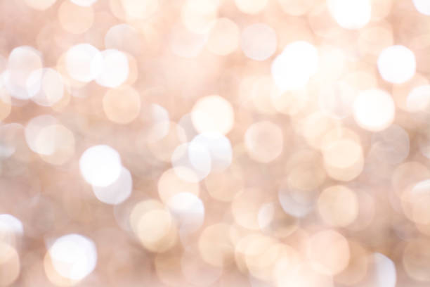 istock gold bokeh, lights. Colorful holiday background. 1215984351