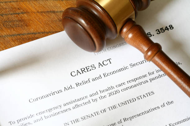 COVID-19 CARES ACT of 2020 Photos of the 2020 Coronavirus Aid, Relief and Economic Security Act alos known as the CARES ACT.  Photos are not of the actual bill but a simulation of the bill. bill legislation photos stock pictures, royalty-free photos & images
