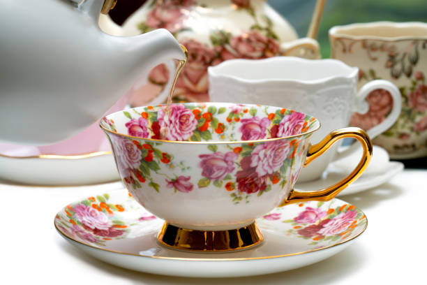 istock Tea is served in a elenat porcelain cup 1215998011