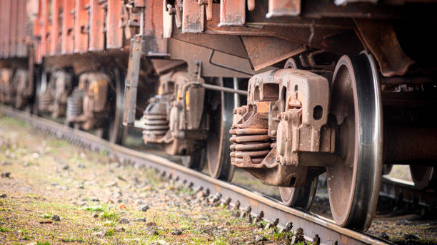 istock Train wheels closeup, selective focus. Rolling stock on track. 1215998765